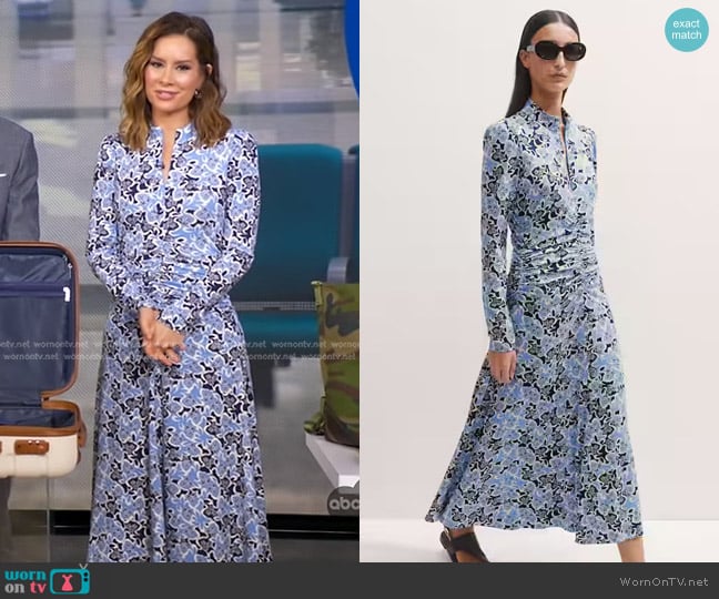 Me + Em Graphic Ribbon Floral Print Midi Dress in Hydrangea Blue/True Blue/Multi worn by Rebecca Jarvis on Good Morning America Me + Em Graphic Ribbon Floral Print Midi Dress in Hydrangea Blue/True Blue/Multi worn by Rebecca Jarvis on Good Morning America