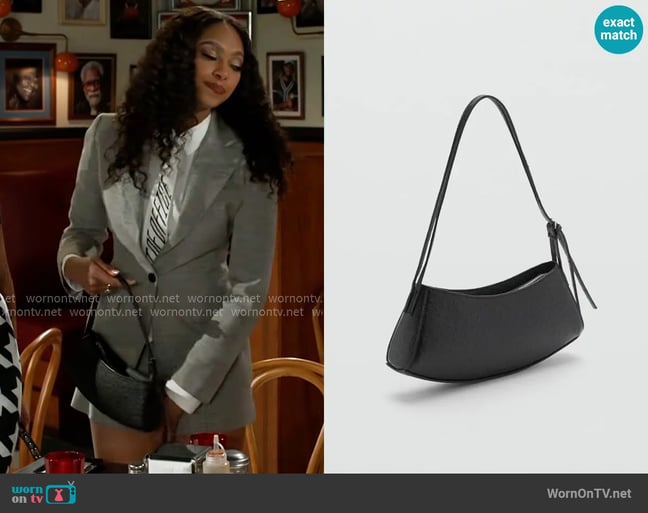 Mango Oval textured bag worn by Kat Richardson (Colby Muhammad) on Beyond the Gates