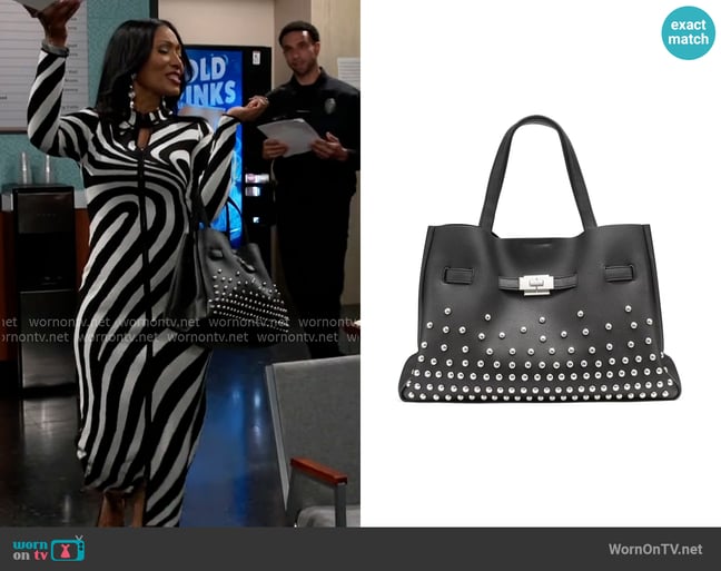DKNY Bryar Large Satchel Handbag worn by Dana 'Leslie' Thomas (Trisha Mann-Grant) on Beyond the Gates DKNY Bryar Large Satchel Handbag worn by Dana 'Leslie' Thomas (Trisha Mann-Grant) on Beyond the Gates