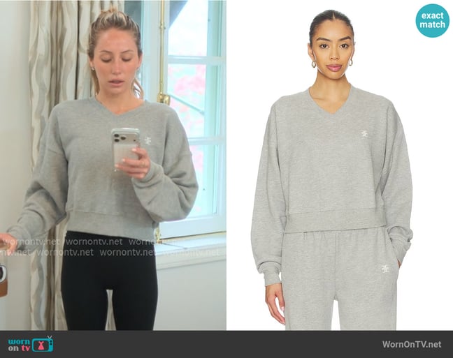 Eterne Cropped V-neck Sweatshirt worn by Alix Earle on Earle Meets World Eterne Cropped V-neck Sweatshirt worn by Alix Earle on Earle Meets World