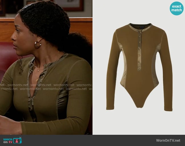 Karen Millen Luxe Viscose Rib Jersey Crew Neck Satin Detail Bodysuit worn by Naomi Hamilton Hawthorne (Arielle Prepetit) on Beyond the Gates Karen Millen Luxe Viscose Rib Jersey Crew Neck Satin Detail Bodysuit worn by Naomi Hamilton Hawthorne (Arielle Prepetit) on Beyond the Gates