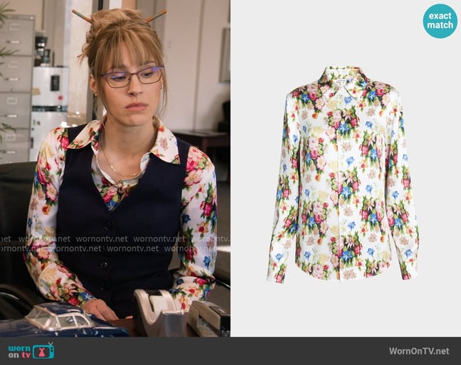 Loewe Floral-Print Button-Down Silk Blouse worn by Lisa Graysh (Lisa Gilroy) on The Paper Loewe Floral-Print Button-Down Silk Blouse worn by Lisa Graysh (Lisa Gilroy) on The Paper
