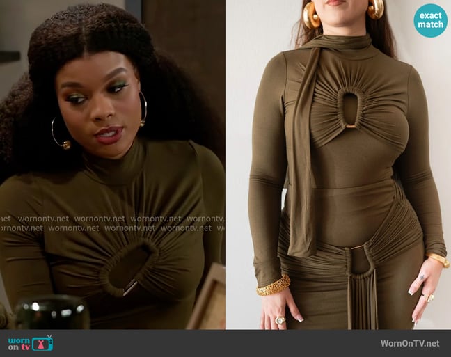 Ri Mi Mila Top worn by Eva Thomas (Ambyr Michelle) on Beyond the Gates Ri Mi Mila Top worn by Eva Thomas (Ambyr Michelle) on Beyond the Gates