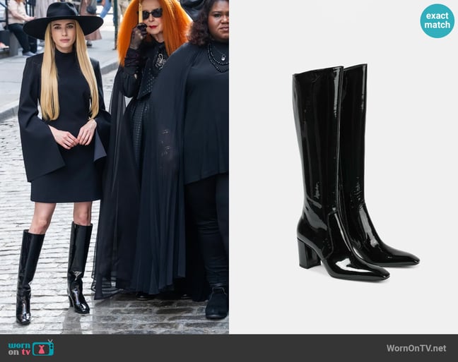 Saint Laurent Lauren 70 patent leather knee-high boots worn by Madison Montgomery (Emma Roberts) on American Horror Story