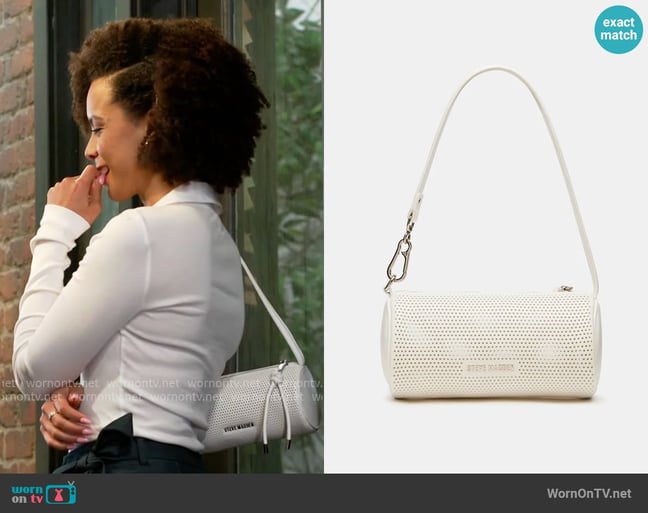 Steve Madden Priya Perforated Bag White worn by Deanna McBride (Angela Fairley) on Beyond the Gates Steve Madden Priya Perforated Bag White worn by Deanna McBride (Angela Fairley) on Beyond the Gates