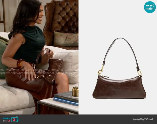 Zara Oblong Shoulder Bag worn by Dani Dupree (Karla Mosley) on Beyond the Gates Zara Oblong Shoulder Bag worn by Dani Dupree (Karla Mosley) on Beyond the Gates