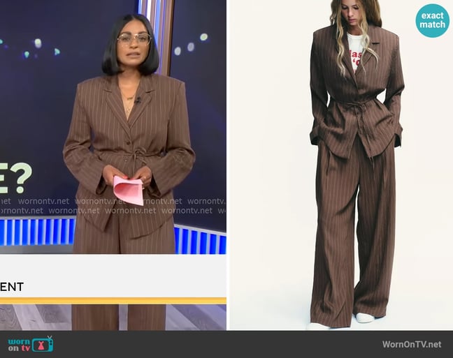 Zara Striped Shoulder Pad Jacket with Thin Belt and Trousers worn by Shanelle Kaul on CBS Mornings Zara Striped Shoulder Pad Jacket with Thin Belt and Trousers worn by Shanelle Kaul on CBS Mornings