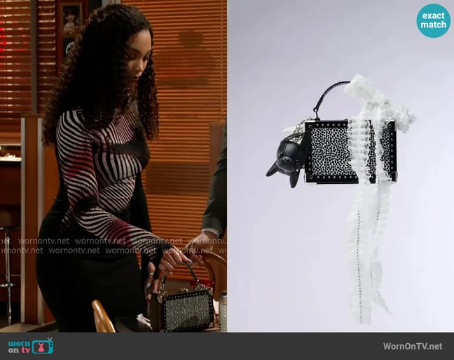 Akira Kelyn Junk Bag worn by Chelsea Hamilton (RhonniRose Mantilla) on Beyond the Gates Akira Kelyn Junk Bag worn by Chelsea Hamilton (RhonniRose Mantilla) on Beyond the Gates