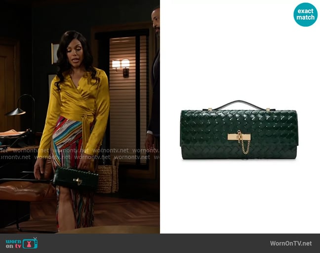 Aldo Roux Clutch Wallet worn by Dani Dupree (Karla Mosley) on Beyond the Gates Aldo Roux Clutch Wallet worn by Dani Dupree (Karla Mosley) on Beyond the Gates