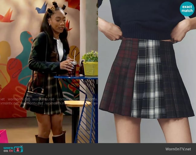 Avec Les Filles Multi-Plaid Pleated Mini Skirt worn by Samantha Richardson (Najah Jackson) on Beyond the Gates Avec Les Filles Multi-Plaid Pleated Mini Skirt worn by Samantha Richardson (Najah Jackson) on Beyond the Gates