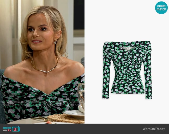 Diane von Furstenberg Leia off-the-shoulder floral-print stretch-jersey top worn by Vanessa McBride (Lauren Buglioli) on Beyond the Gates