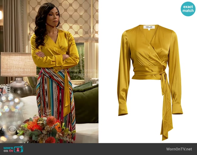Diane von Furstenberg Perfect Wrap Top in Lemon Curry worn by Dani Dupree (Karla Mosley) on Beyond the Gates Diane von Furstenberg Perfect Wrap Top in Lemon Curry worn by Dani Dupree (Karla Mosley) on Beyond the Gates