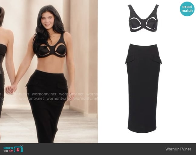 Jean Paul Gaultier Black Cut-Out Cone Bra and Midi Skirt Set worn by Kylie Jenner (Kylie Jenner) on The Kardashians Jean Paul Gaultier Black Cut-Out Cone Bra and Midi Skirt Set worn by Kylie Jenner (Kylie Jenner) on The Kardashians