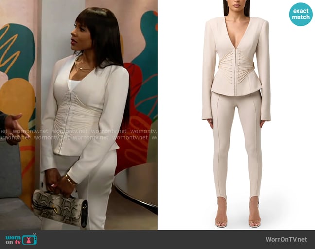 Naked Wardrobe Suiting V-Neck Corset Blazer and Leggings in Melange Beige worn by Hayley Lawson (Marquita Goings) on Beyond the Gates Naked Wardrobe Suiting V-Neck Corset Blazer and Leggings in Melange Beige worn by Hayley Lawson (Marquita Goings) on Beyond the Gates
