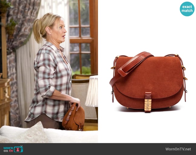 Pinko Classic Saddle Bag worn by Sharon Newman (Sharon Case) on The Young and the Restless Pinko Classic Saddle Bag worn by Sharon Newman (Sharon Case) on The Young and the Restless