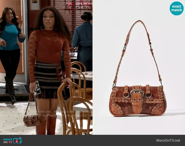 Silence + Noise at Urban Outfitters Jade Laced Rivet Bag worn by Eva Thomas (Ambyr Michelle) on Beyond the Gates Silence + Noise at Urban Outfitters Jade Laced Rivet Bag worn by Eva Thomas (Ambyr Michelle) on Beyond the Gates