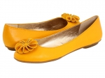 Yellow flats with flower embellishment at 6pm