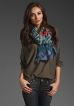 Blue patterned scarf at Revolve