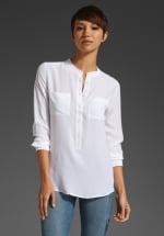 White long sleeve blouse at Revolve