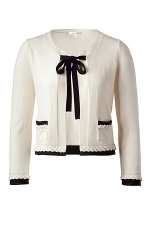 White cardigan with black tie at Stylebop