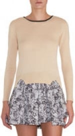 Robin's cream sweater top at Barneys