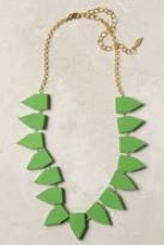 Aria's green necklace at Anthropologie