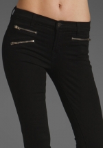 Black jeans with zip pockets at Revolve