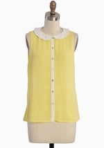 Yellow button front top at Ruche