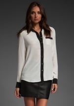 Black and white blouse at Revolve