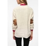 Similar style sweater at Urban Outfitters