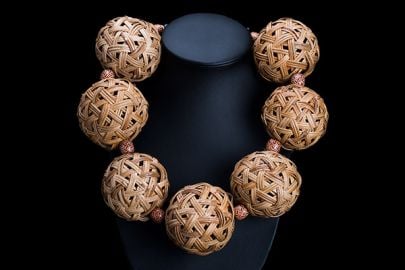 A Thai Necklace Of Seven Large Round Interlocking Cane Bands Hollow Beads With Small Wood Spacers at Pebble London