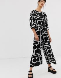 ASOS DESIGN Tie Waist Jumpsuit in mono geo print at Asos