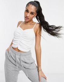 ASOS DESIGN ribbed crop cami with ruched front in white at Asos