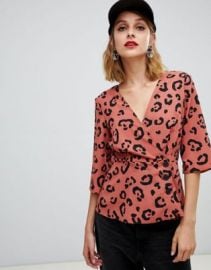 ASOS DESIGN wrap top with button detail in animal print at asos com at Asos