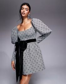 ASOS Flocked bow puff sleeve mini dress with velvet bow at ASOS