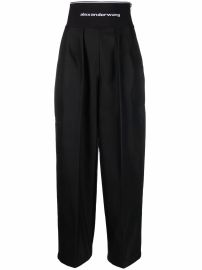 Alexander Wang logo-waist pressed-crease Trousers - at Farfetch