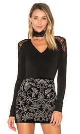 Alice   Olivia Nancey Lace Bodysuit in Black from Revolve com at Revolve