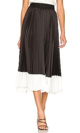 Alice  Olivia Katz Pleated Midi Skirt in Colorblock Stripe Black  Off White at Revolve