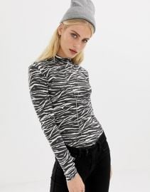 AllSaints Zee Kiara jersey top in zebra stripe at ASOS