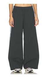 Alo Highwaist Origin Wide Leg Track Pant In Charcoal Green at Revolve