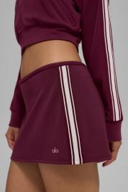 Alo Yoga Track Star Mini Skirt in Burgundy at Alo Yoga