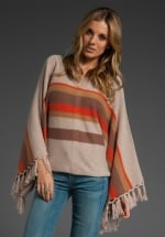 Aprils striped poncho at Revolve