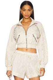 Area Crystal Trim Track Jacket In Cream at Revolve