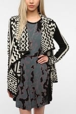 Aria's black and white cardigan from Urban Outfitters at Urban Outfitters