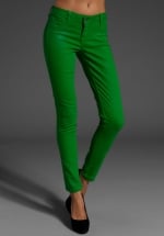 Aria's green jeans at Revolve at Revolve