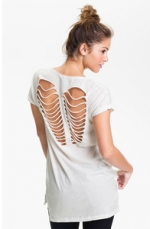 Aria's white shredded back tee at Nordstrom