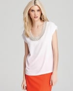 Ashley's white beaded top by DvF at Bloomingdales