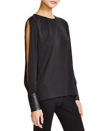 WornOnTV: Quinn’s black split-sleeve blouse with leather cuffs on The ...