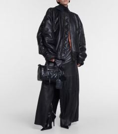 Balenciaga Oversized leather bomber jacket at Mytheresa