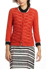 Betsey's orange cardigan at Anthropologie at Anthropologie